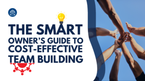 A digital graphic with the title "The Smart Owner’s Guide to Cost-Effective Team Building" in bold blue and black text. The left side features icons, including an envelope and a red gear, while the right side shows a photograph of diverse hands joining together against a blue sky, symbolizing teamwork. A green curved shape overlays part of the image.